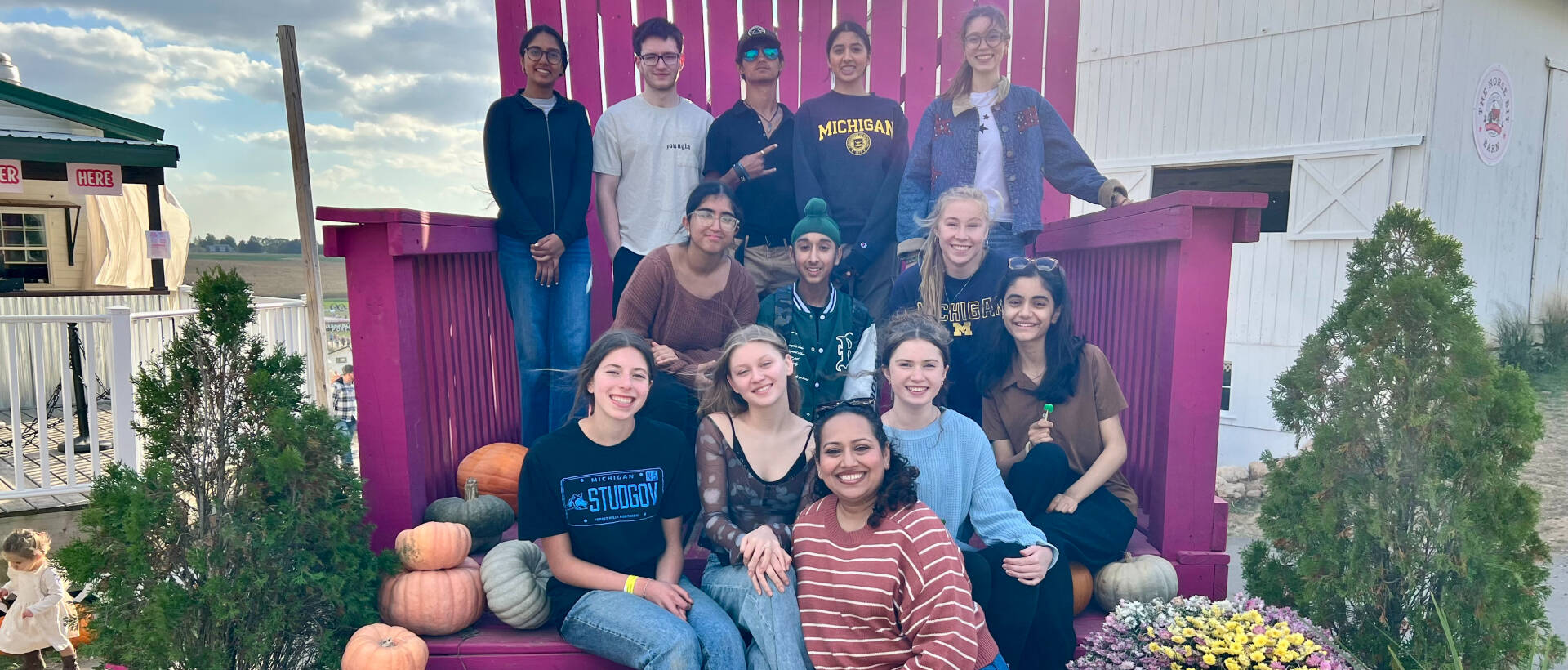 Scholars group shot at apple orchard